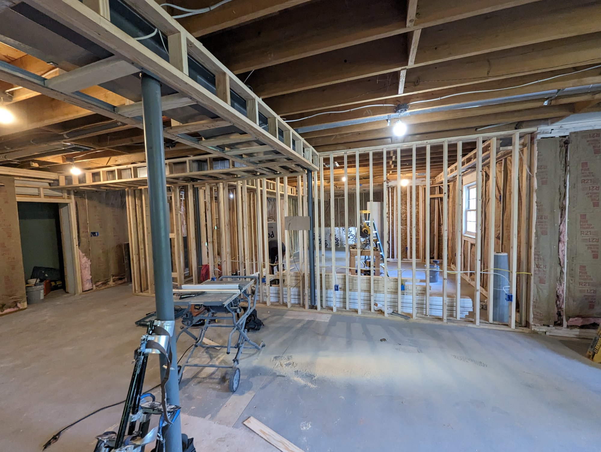 Large Chester County basement fully framed with 2x4 walls, steel column visible, insulation staged