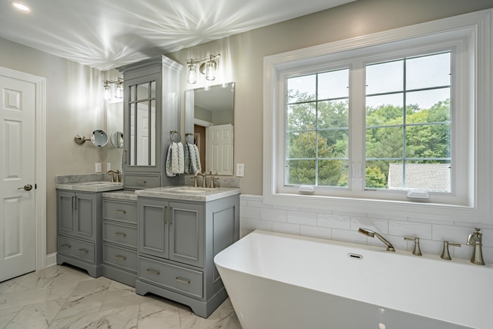 Luxury master bathroom with custom tile and modern fixtures