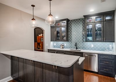 Glenmoore custom bar and wine room with arabesque tile