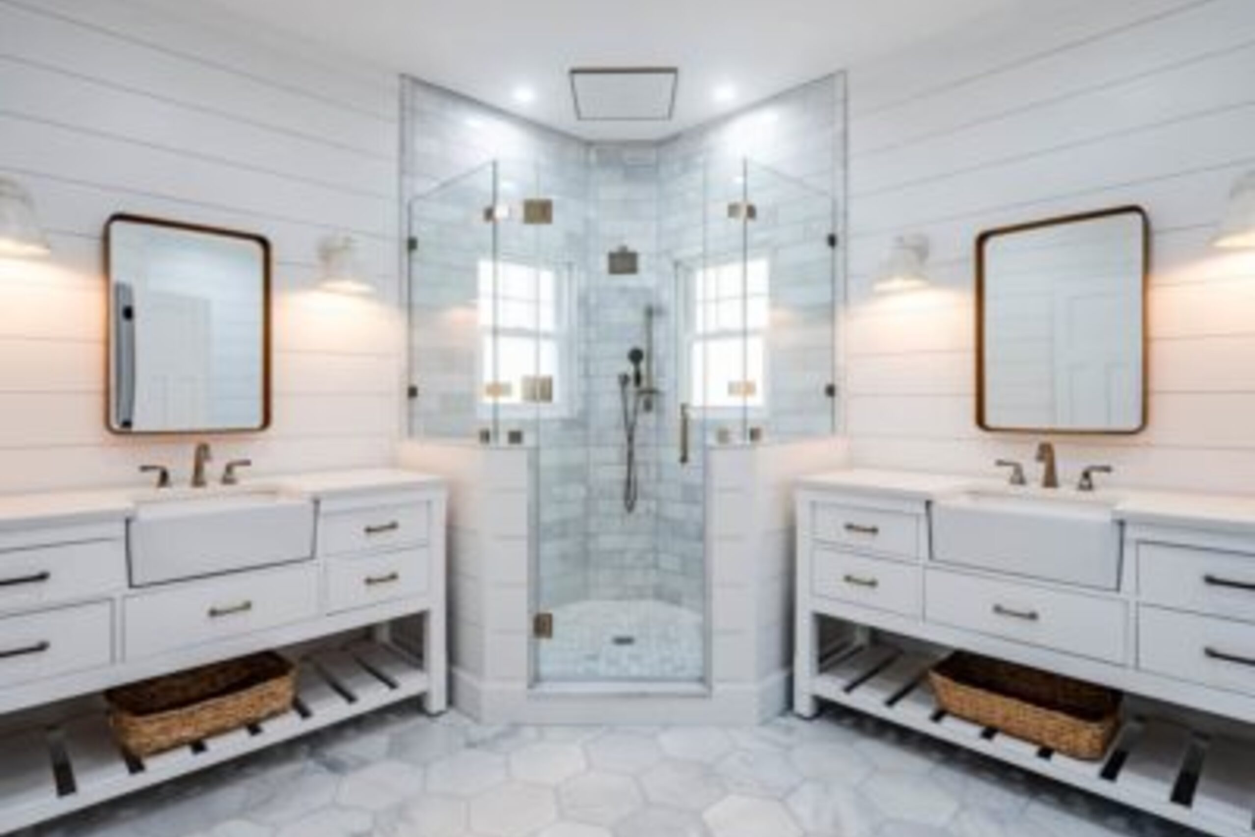 Downingtown master bathroom dual vanities with marble hex floor, glass corner shower, and shiplap walls